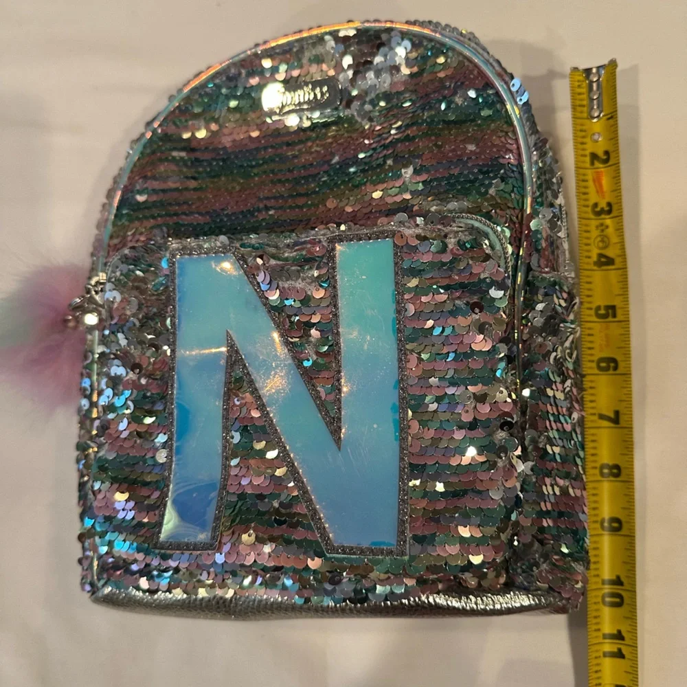 Justice Small Silver Sequin Backpack with Pom Pom Initial (Letter N)